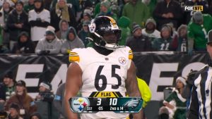 Dan-Moore-Jr.-holding-penalty-upset.jpg