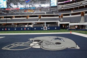 Cowboys-logo-on-field-scaled.jpg