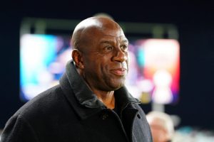 commanders-minority-owner-magic-johnson-celebrates-washington-first-nfl-playoff-win-19-years-1024x68.jpeg