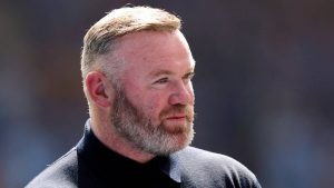 former-player-wayne-rooney-on-the-pitch-during-a-commemorative-ceremony-after-the-last-match-for-the.jpeg